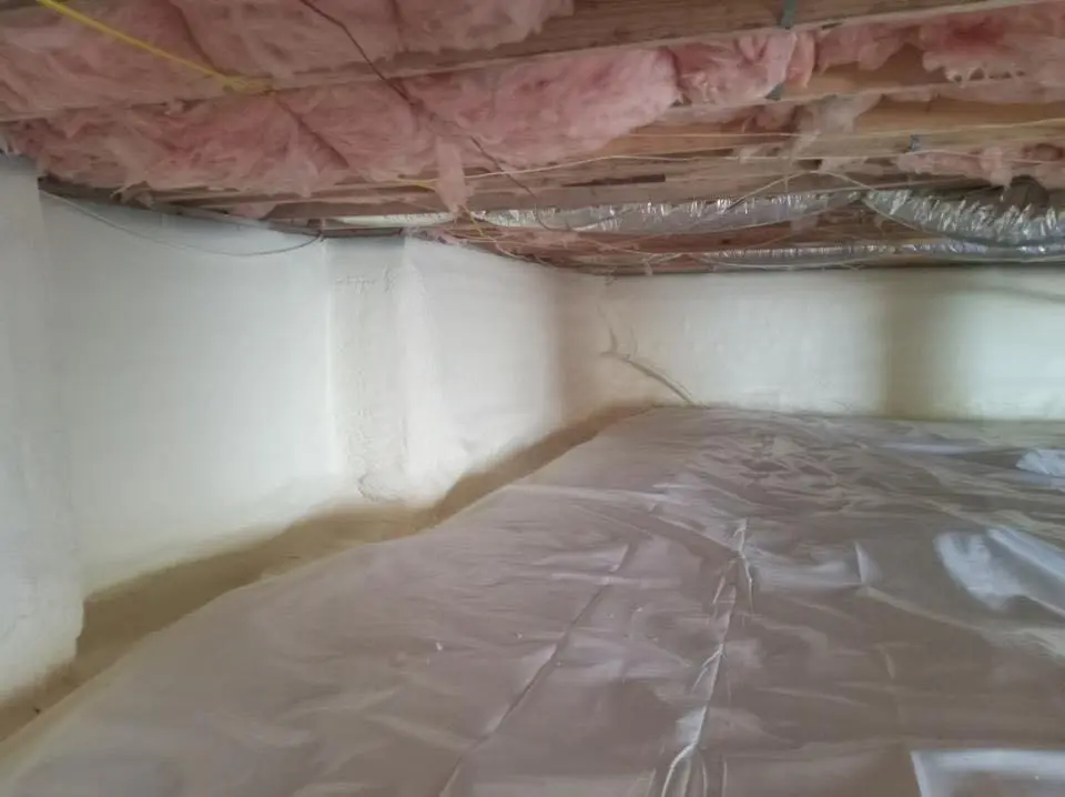 Crawl space encapsulation with closed-cell spray foam for Commercial Roof Restoration in Jamestown